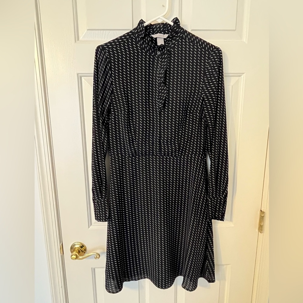 H&M black and white ruffle dress with side zip, size S.